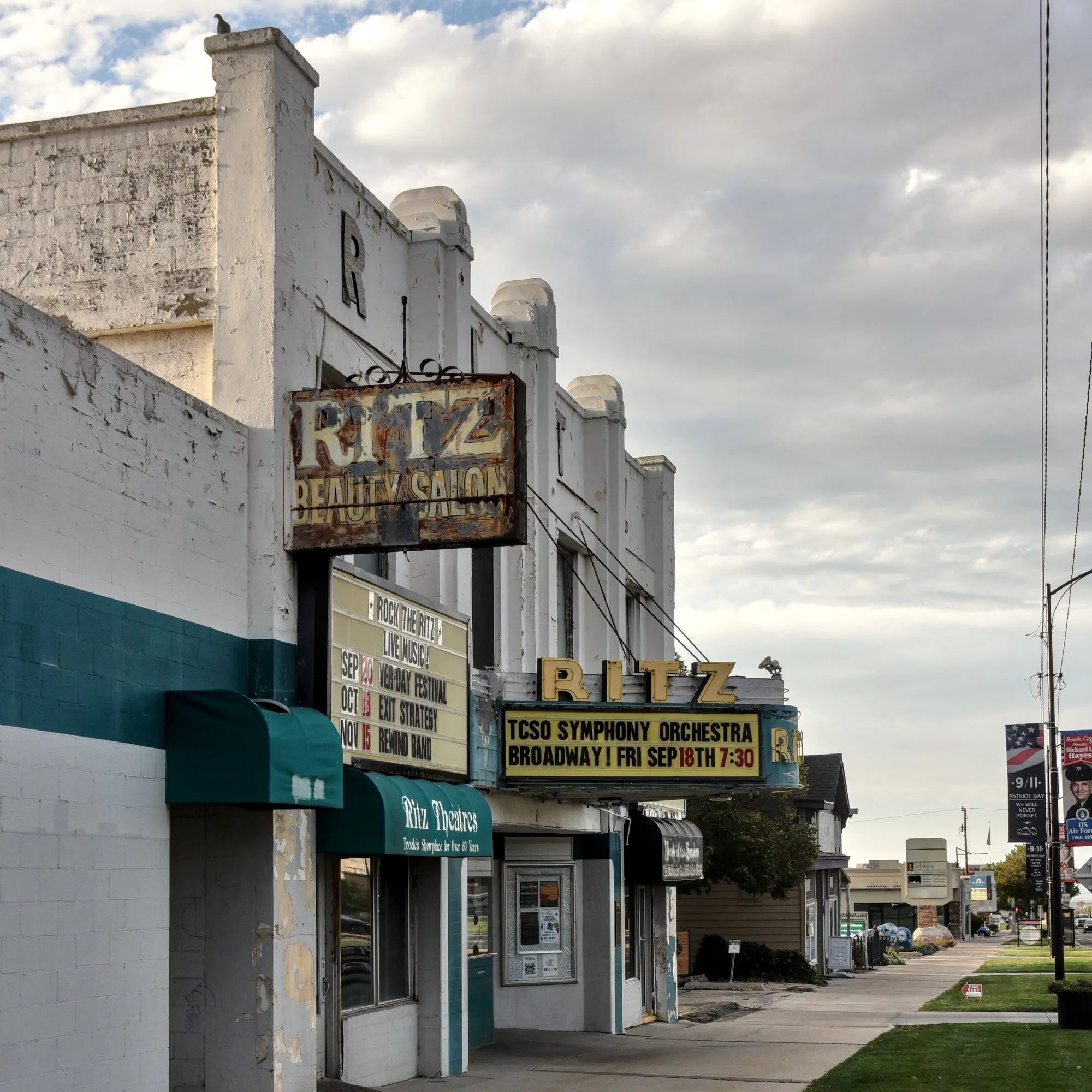 Ritz Theatre marquee and storefronts on a small-town main street